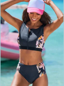 Bas de maillot de bain coloris uni tendance avec empiècements imprimés sur les côtés