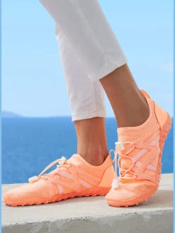 Baskets semelle plate et flexible, qui vous donne l'impression de marcher pieds nus