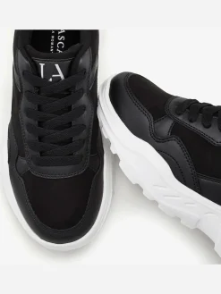 Baskets talon légèrement compensé au style chunky tendance