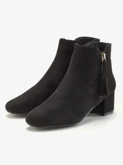 Bottines détails houppe tendance