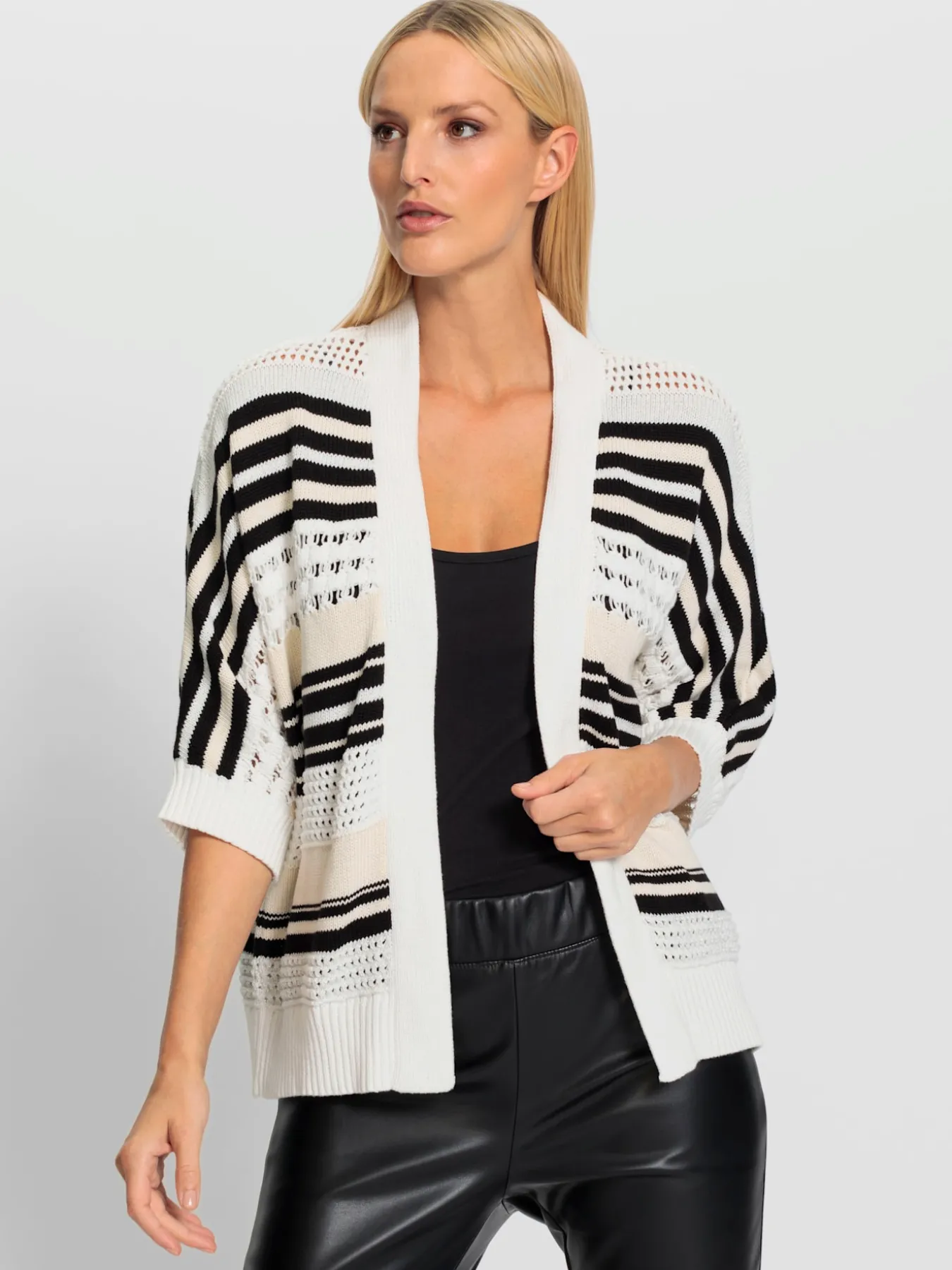 Cardigan motif ajouré transparent discret
