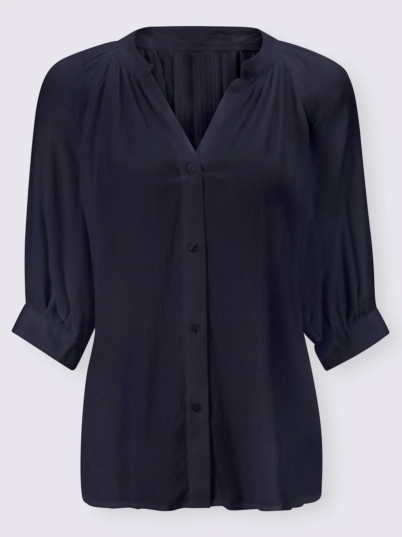 Chemisier à manches courtes look tendance avec ourlet arrondi