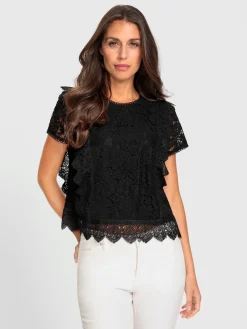 Chemisier en coton avec différents motifs de dentelle