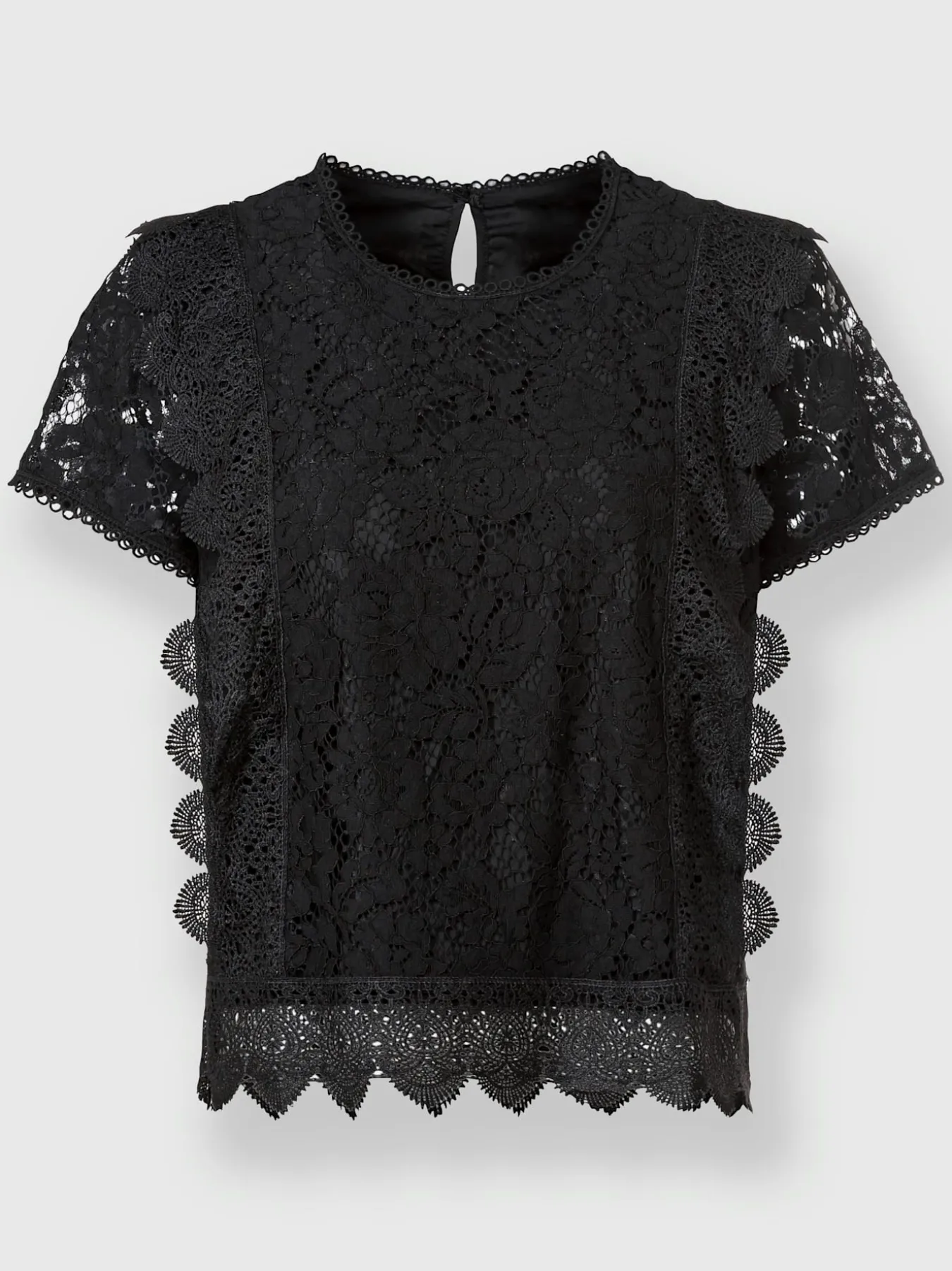 Chemisier en coton avec différents motifs de dentelle