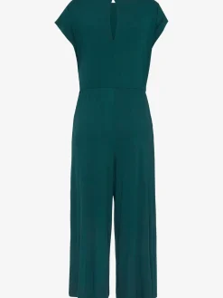 Combinaison pantalon large encolure ronde avec fermeture boutonnée au dos