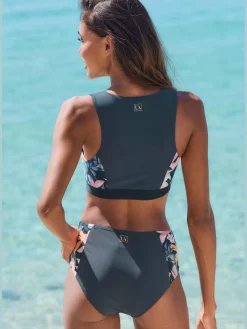 Haut de maillot de bain court coloris uni tendance avec empiècements imprimés sur les côtés