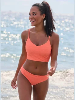 Haut de maillot de bain court matière structurée aux couleurs tendances
