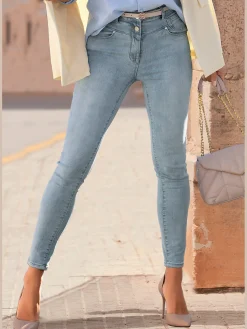Jean skinny fit patte de boutonnage visible devant