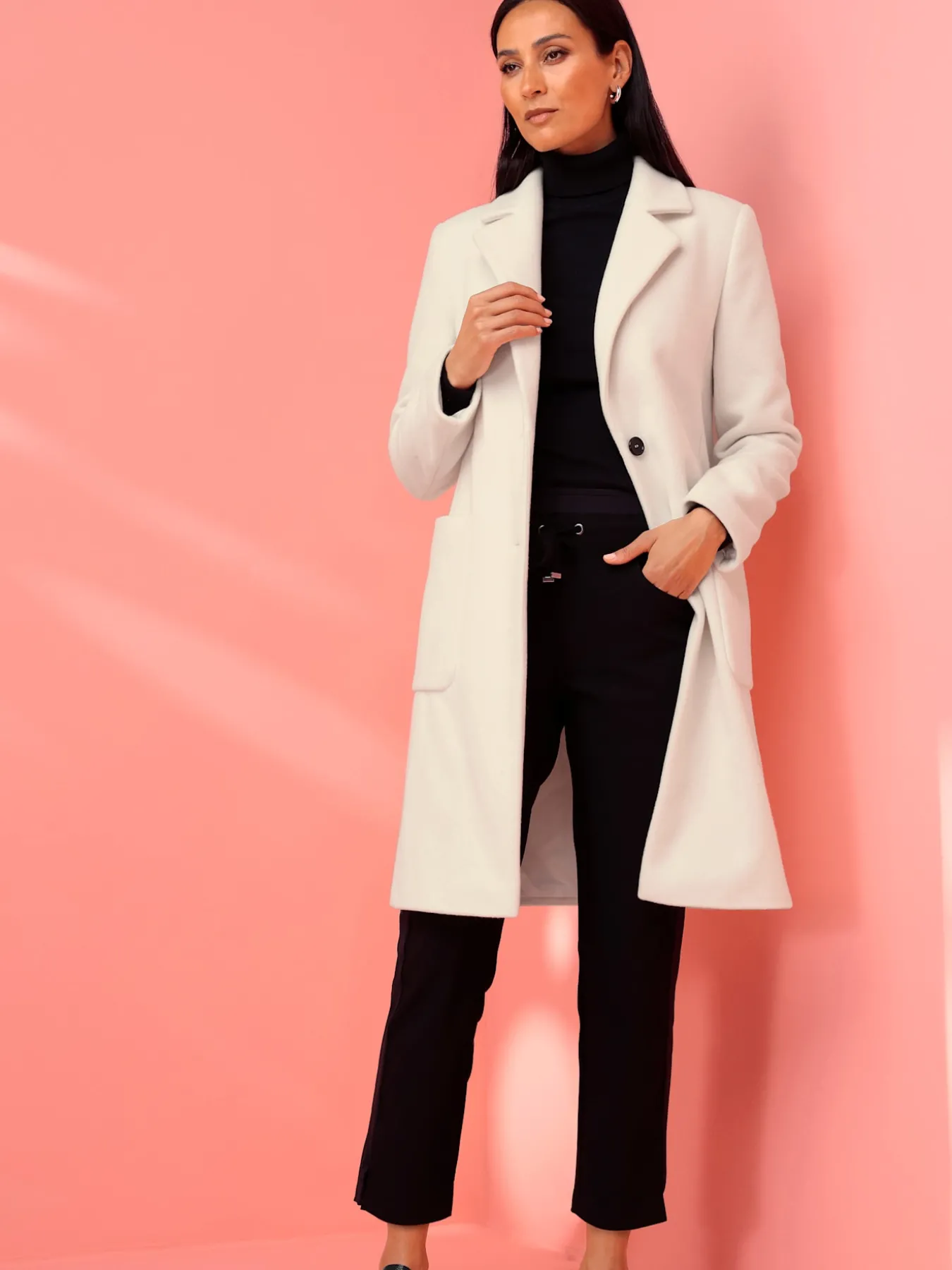 Manteau court poches plaquées spacieuses