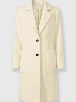 Manteau court poches plaquées spacieuses