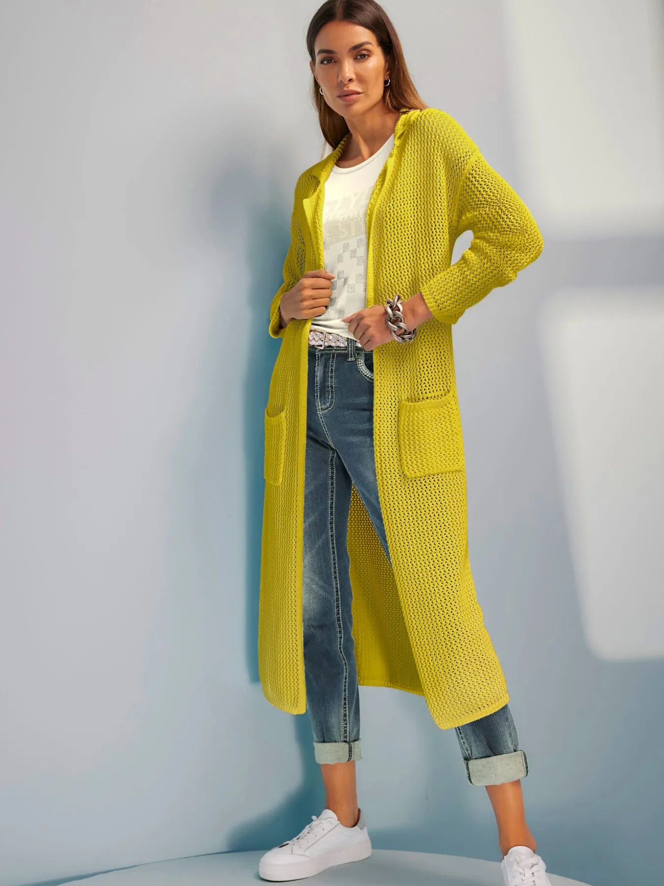Manteau en tricot joli motif ajouré