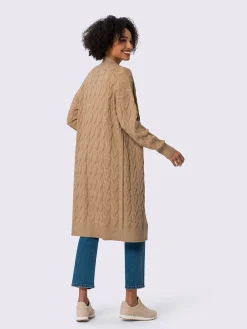 Manteau en tricot superbe motif torsadé