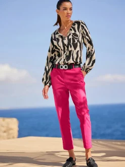 Pantalon 7/8 œillets au bas des jambes