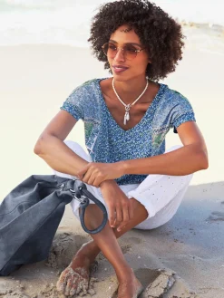 Pantalon 7/8 motif ajouré
