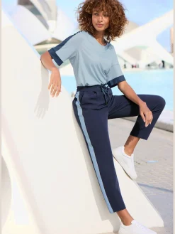 Pantalon ceinture lisse devant. élastique au dos
