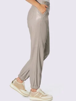 Pantalon en synthétique boutons fantaisie dorés