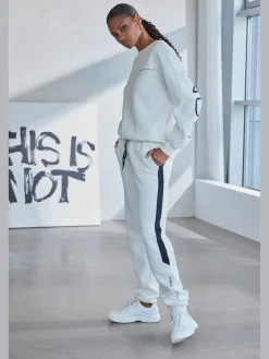 Pantalon molletonné pantalon sweat avec poche latérale fendue