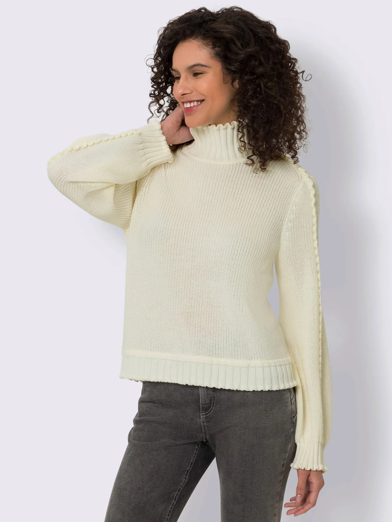 Pull à col montant finitions ondulées flatteuses