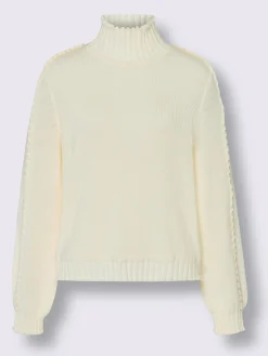 Pull à col montant finitions ondulées flatteuses