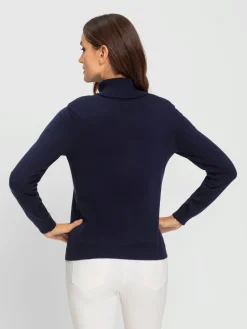 Pull à col roulé beaux boutons fantaisie.