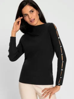 Pull à col roulé découpes raffinées aux manches