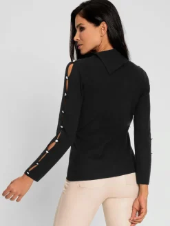 Pull à col roulé découpes raffinées aux manches