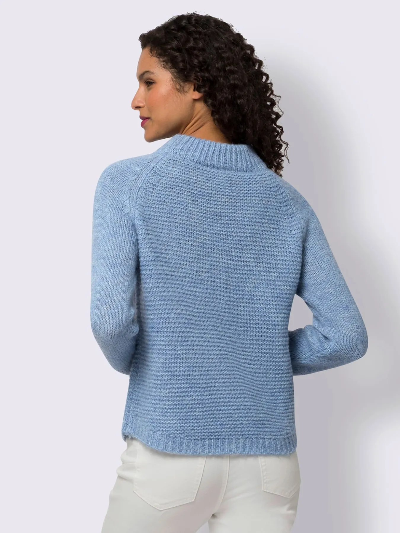 Pull en tricot col corolle