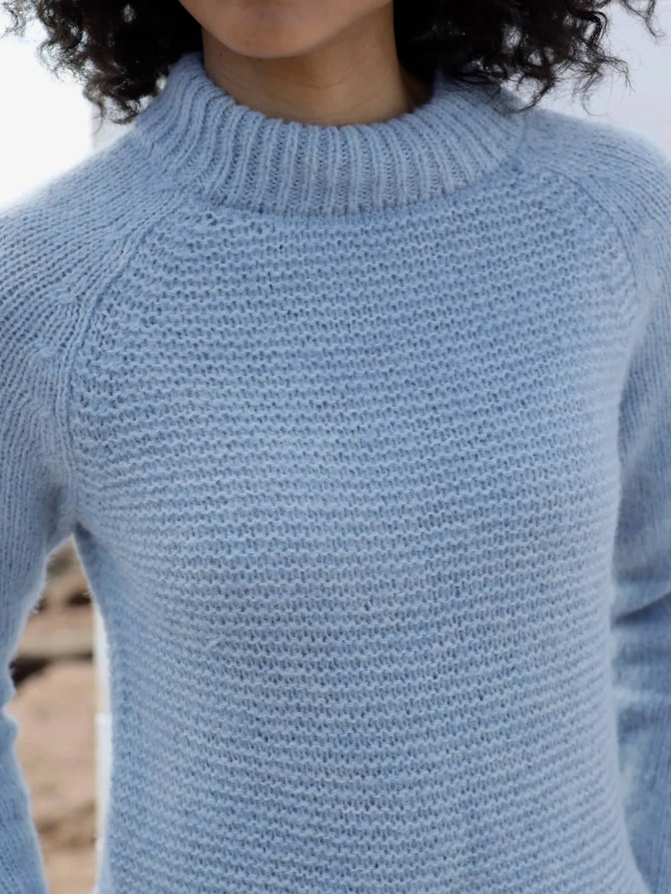 Pull en tricot col corolle