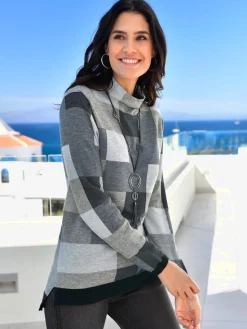 Pull femme à carreaux intarsia col montant