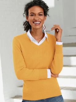 Pull femme coupe classique col en v finitions côtelées