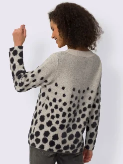 Pull jacquard motif à pois tendance
