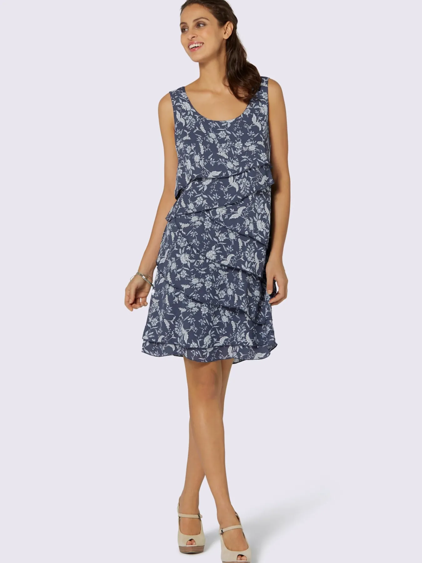 Robe à motif floral et effet superposé affinant