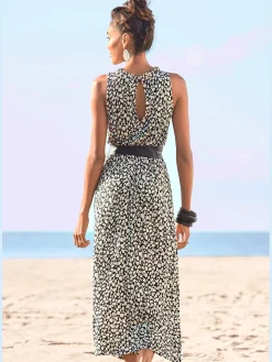 Robe en jersey encolure haute volantée