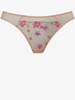String féminin avec jolis accessoires à la ceinture avant