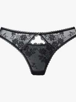 String séduisant avec nœud décoratif et élégant accessoire brillant