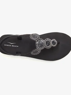 Tongs avec semelle imperméable et applications brillantes