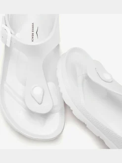 Tongs mules de bain estivale en matière imperméable avec bride réglable