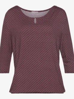 T-shirt à col rond encolure ronde avec petite ouverture et bouton doré devant