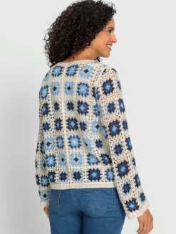 Veste en tricot aspect crochet