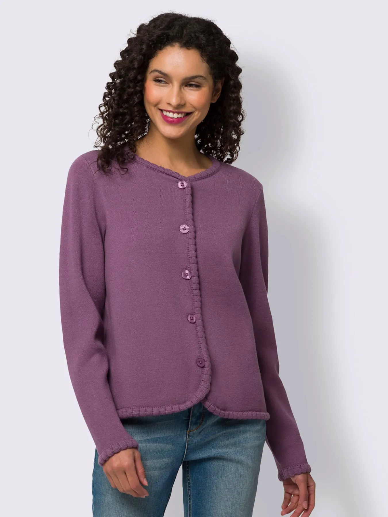 Veste en tricot bords ondulés élégants