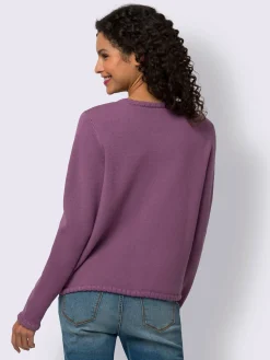 Veste en tricot bords ondulés élégants
