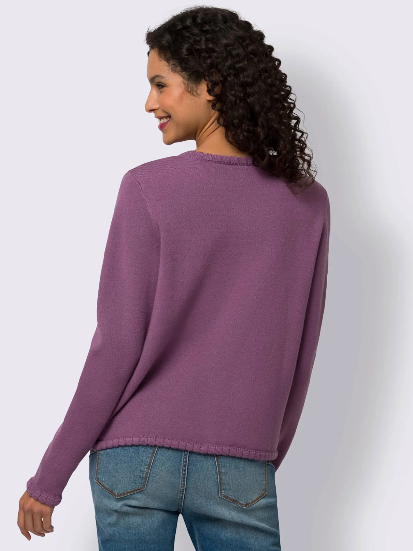 Veste en tricot bords ondulés élégants