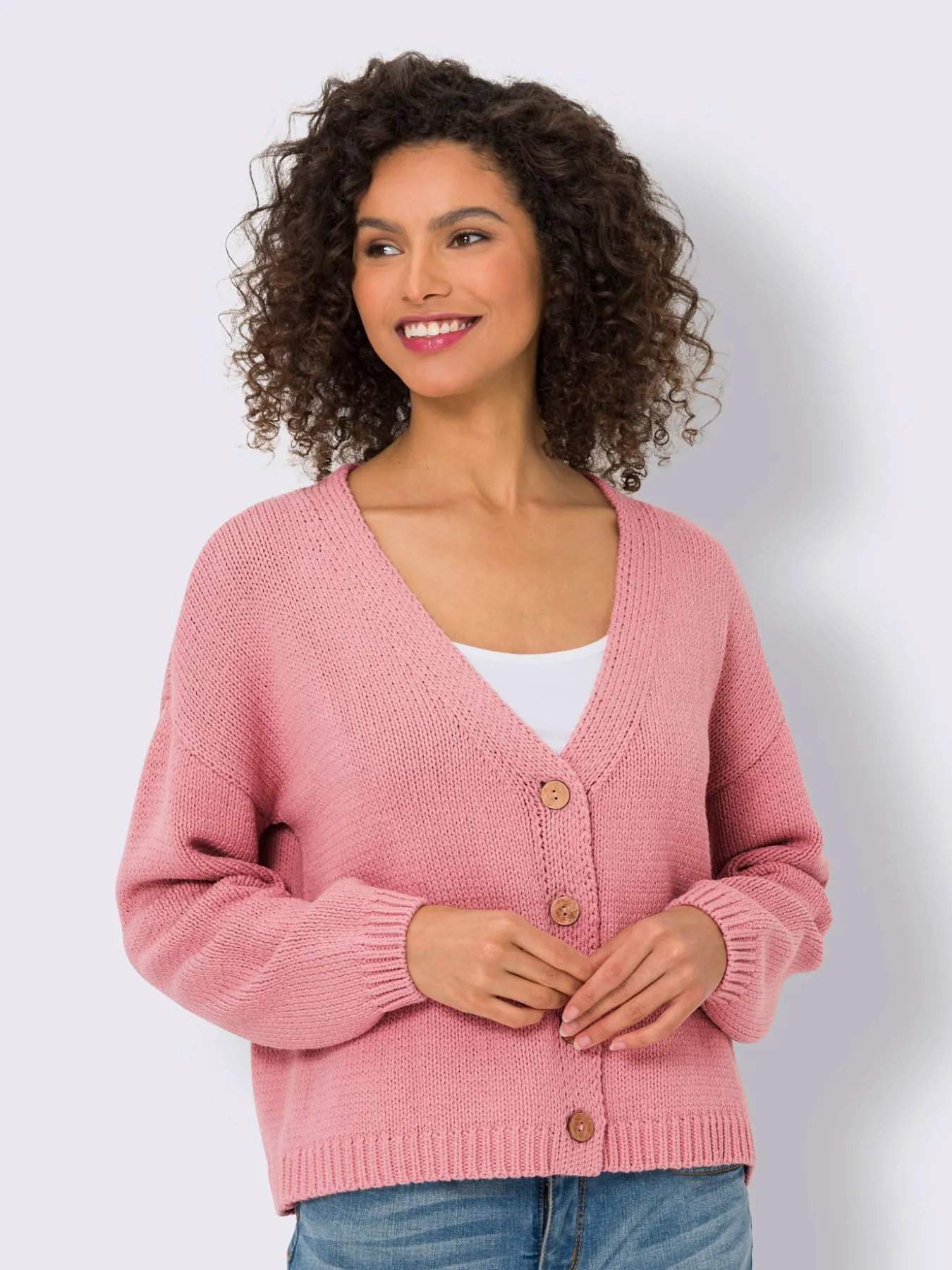Veste en tricot boutons imitation bois