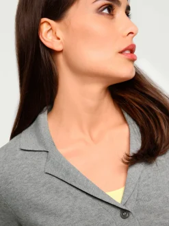Veste en tricot fin superbe basique avec poches plaquées