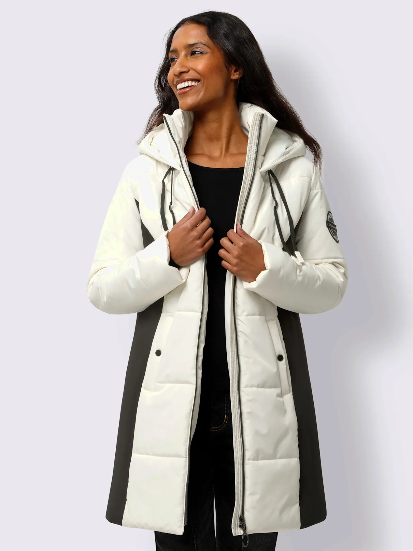 Veste longue empiècements latéraux affinants
