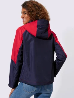 Veste technique capuche amovible grâce à une glissière