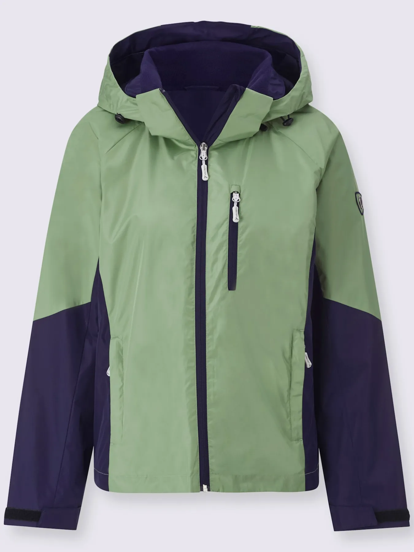 Veste technique capuche amovible grâce à une glissière